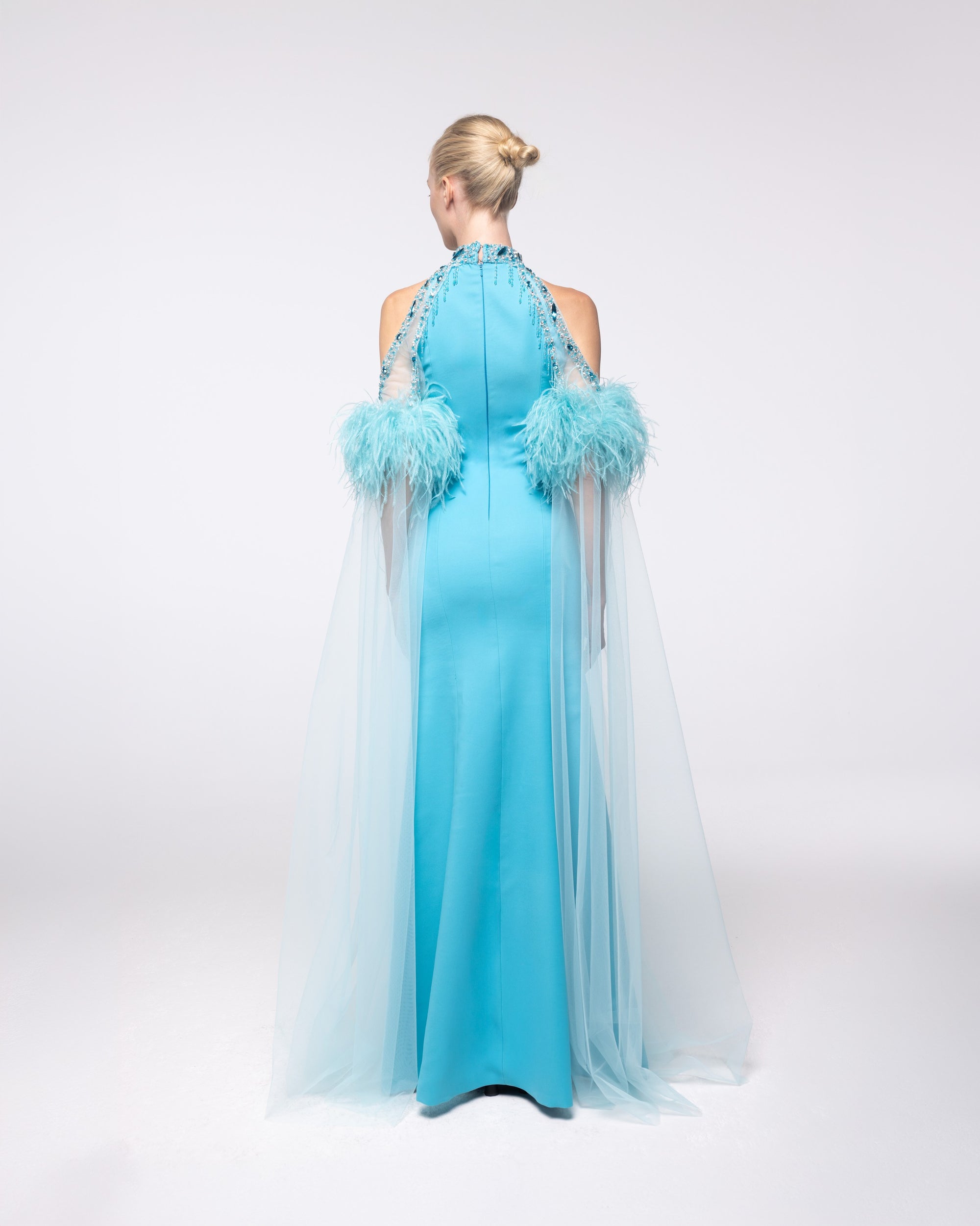 Regalia Aquamarine Feather Halter Cape Gown, back view | Helen of Troy SS27 | Maison MOOEi