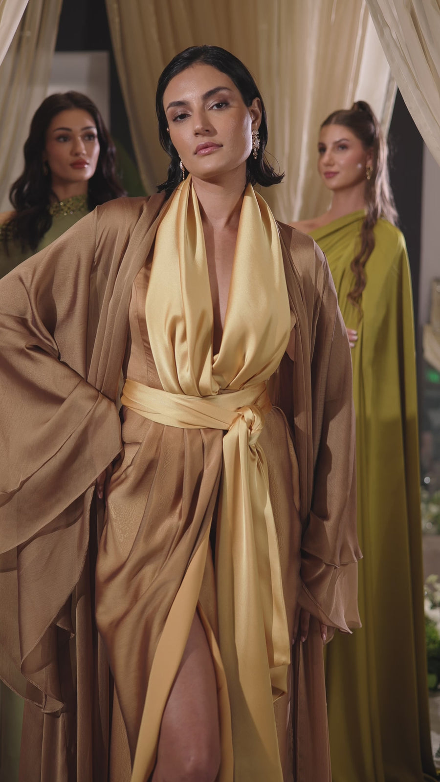 Elegant woman modeling the Kelly Set from Vérité Majestique PF collection, showcasing luxury evening wear.