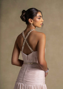 Avelisse Dress featuring a back view with intricate beading and elegant pleating, perfect for evening wear.