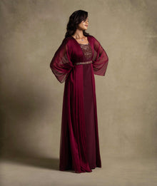 Burgaya Dress in maroon with chiffon overlay, beaded neckline, and sheer sleeves for elegant evening wear.