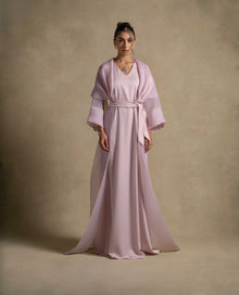 Isis Set showcasing a luxurious pink quartz maxi dress with a belted waist and sheer organza overlay, perfect for evening wear.