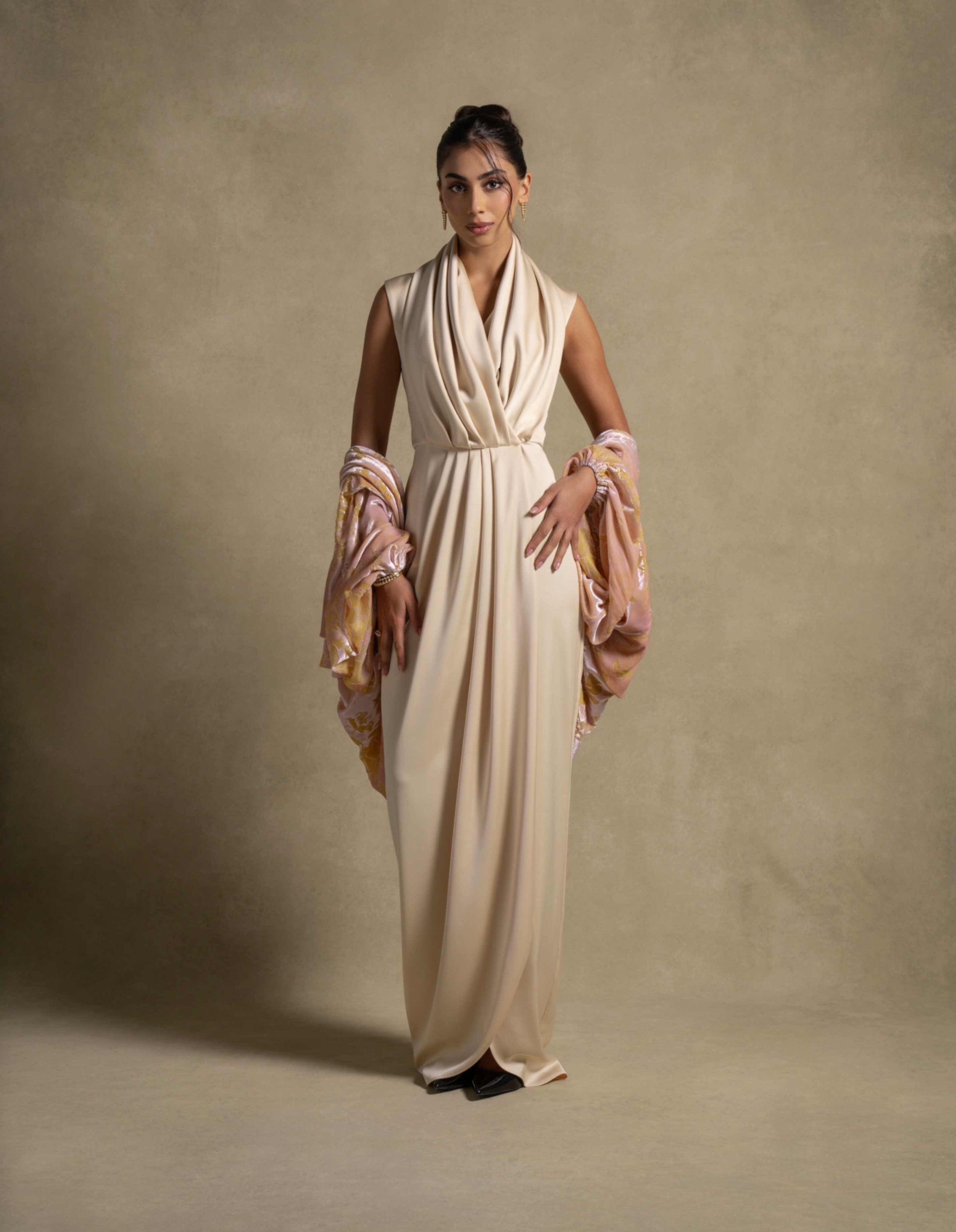 Selene Set elegant maxi dress in soft beige with a textured cape, ideal for high-end evening wear and luxury fashion.