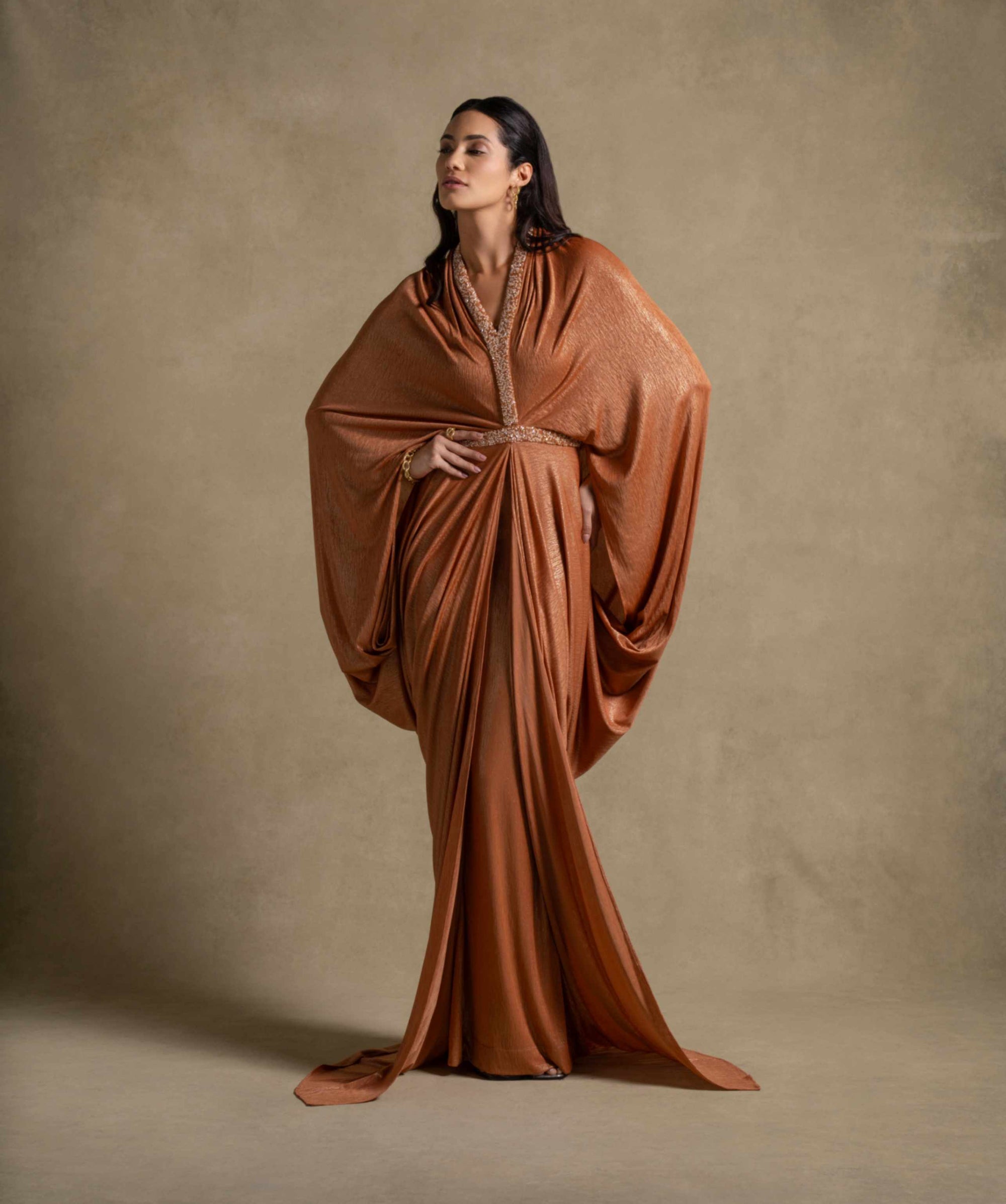 Moon Set: Isabeau gown in radiant Tangerine from Zarina Collection, showcasing luxury evening wear fashion for women.