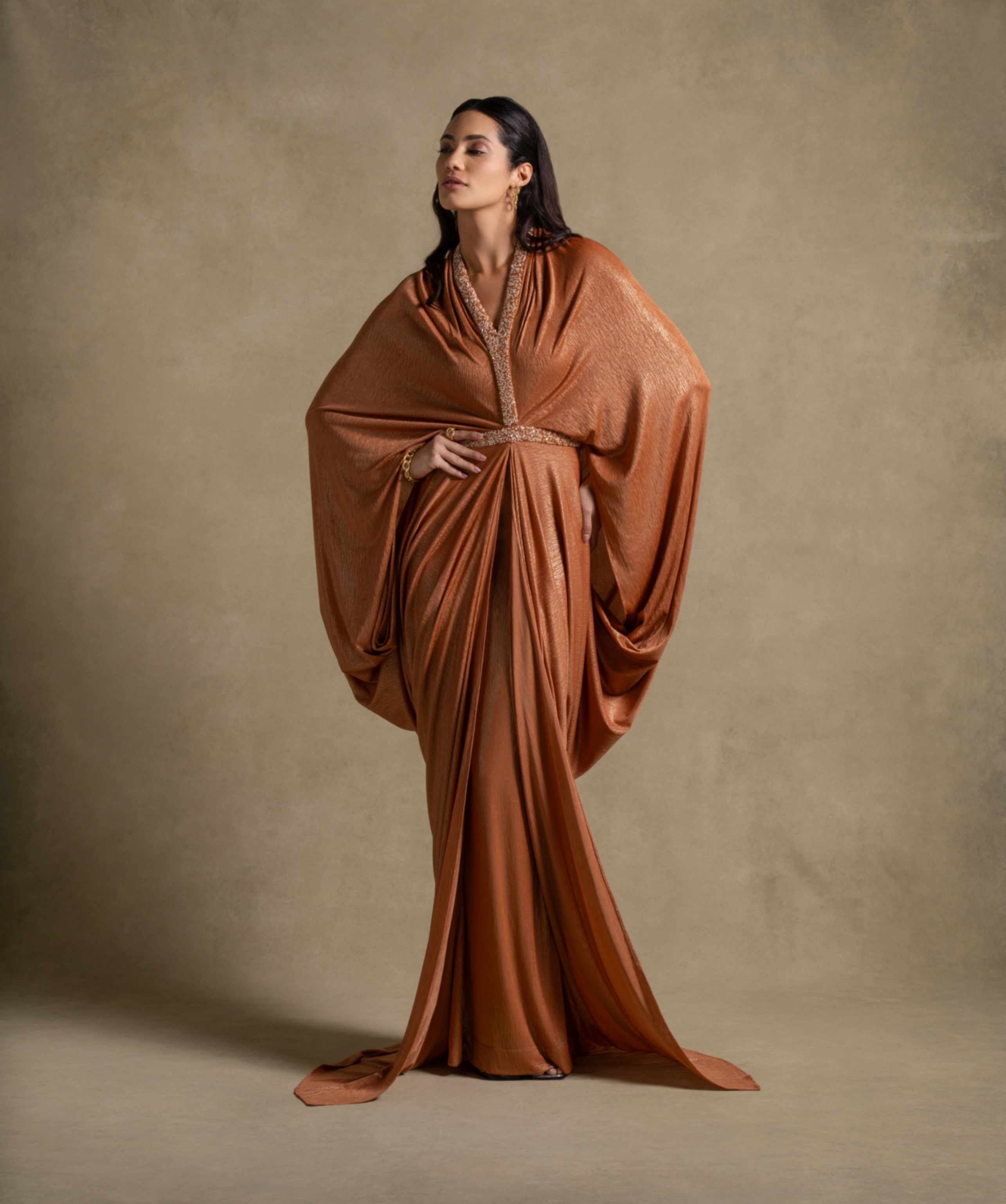 Moon Set: Isabeau gown in radiant Tangerine from Zarina Collection, showcasing luxury evening wear fashion for women.