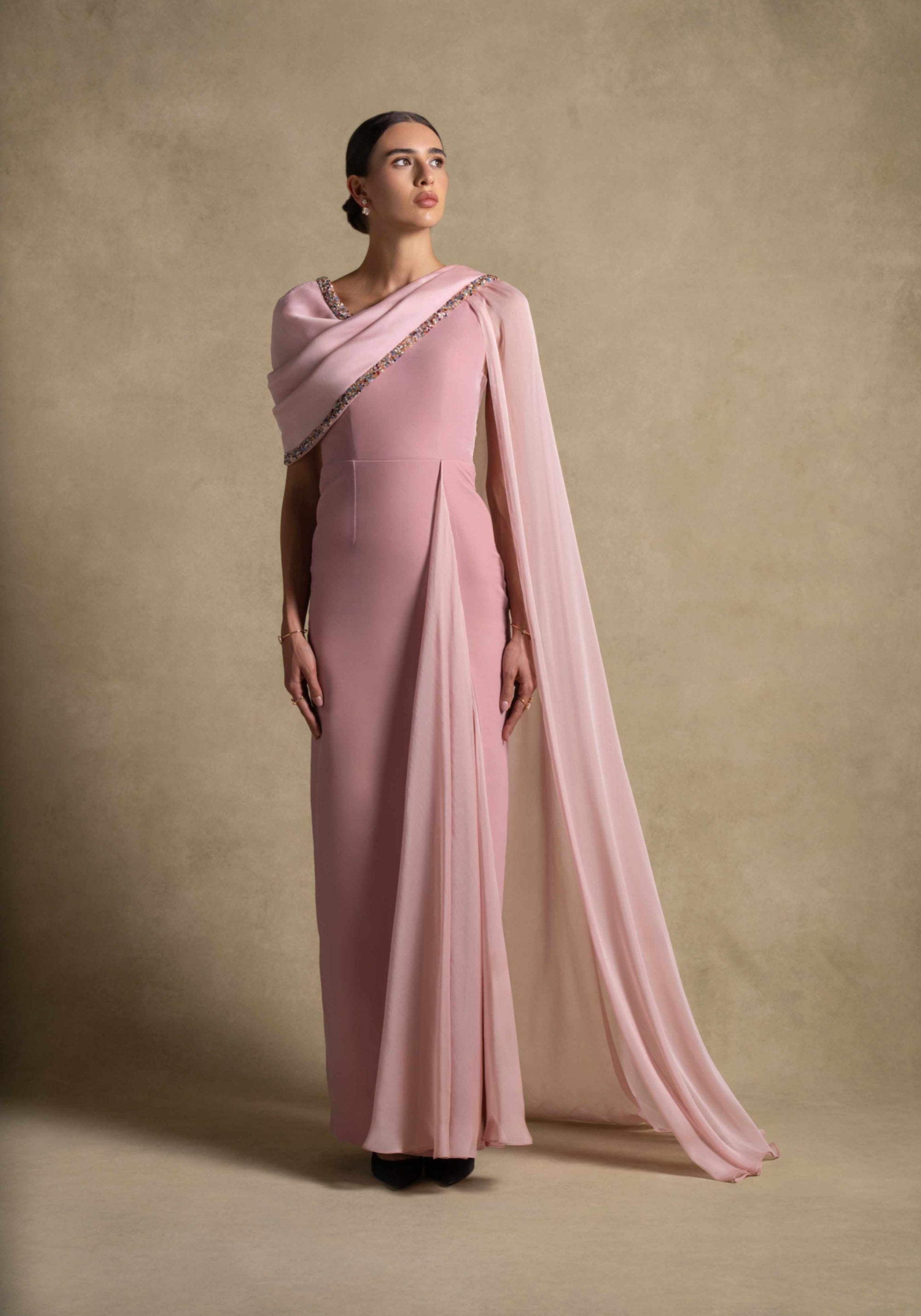 Meghan Dress in soft Pink Quartz with chiffon drape and beadwork, perfect for evening wear and luxury fashion.