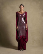 Vionna Dress in deep maroon with a metallic finish bodice and draped jersey panels, perfect for luxury evening wear.