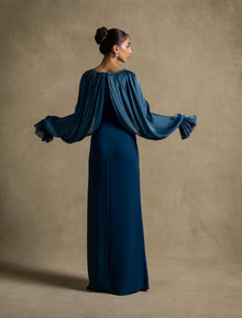 Zoe Dress featuring a pleated organza drape and voluminous sleeves in turquoise, perfect for evening wear.