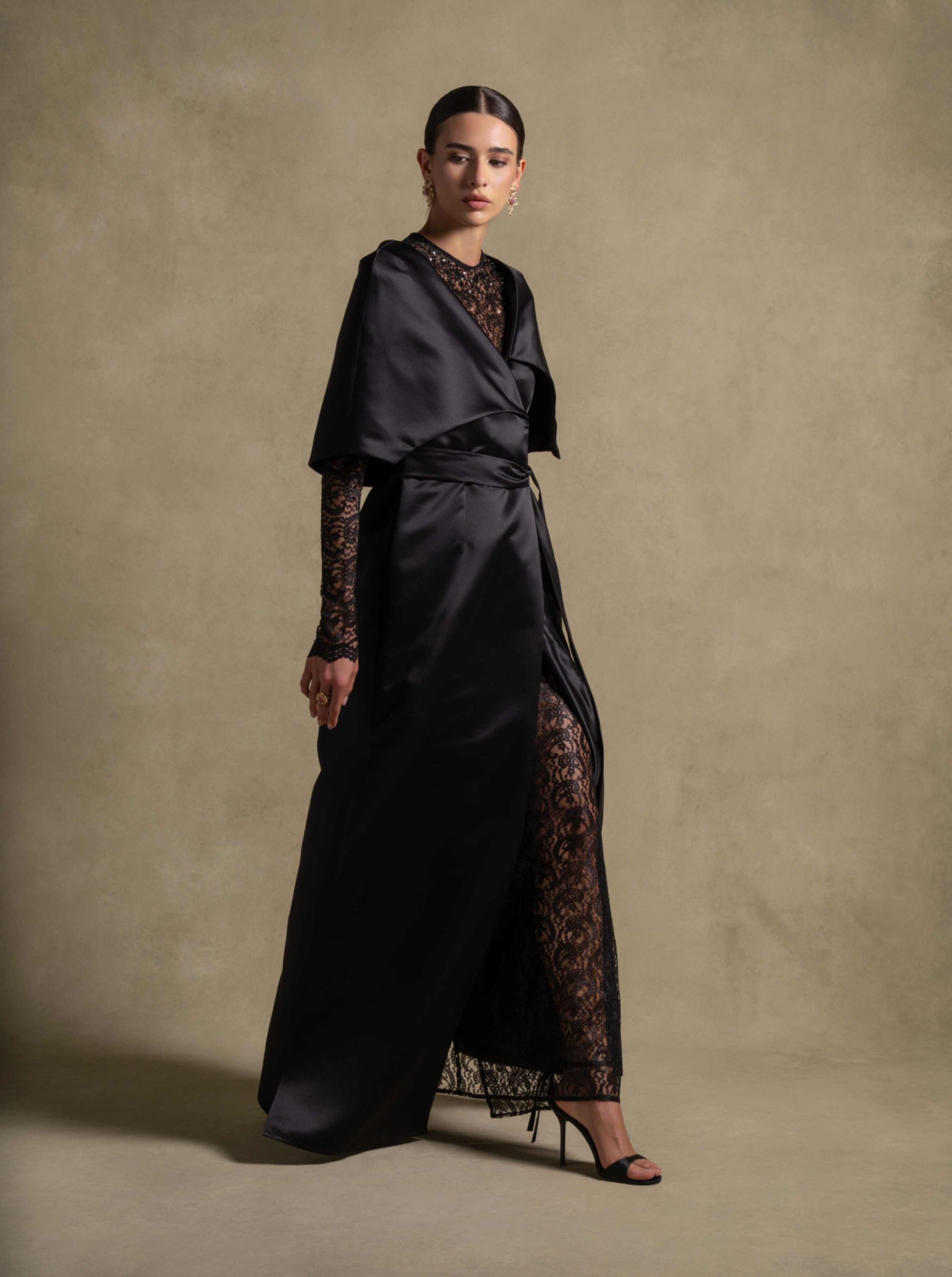 Eterna Set black gown with satin wrap silhouette and French lace, perfect for luxury evening wear and high end fashion.
