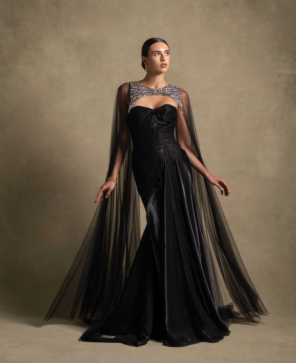 Neriah Set black gown from Zarina Collection featuring a sweetheart neckline and sheer tulle cape, perfect for luxury evening wear.