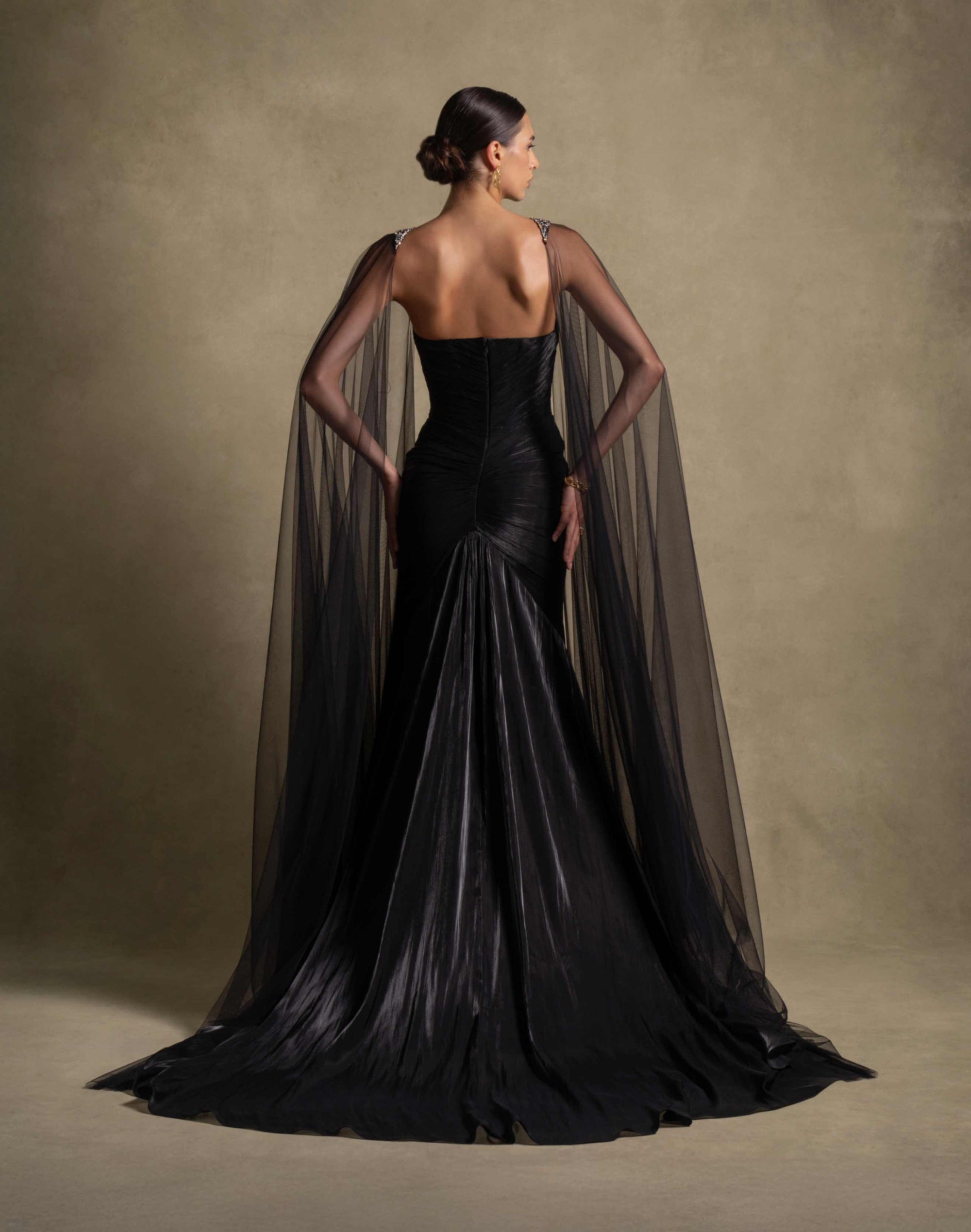 Neriah Set black evening gown with sheer tulle cape, perfect for luxury and high end fashion events.
