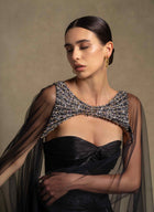 Neriah Set couture black gown with sweetheart neckline and sheer tulle cape, perfect for luxury evening wear.