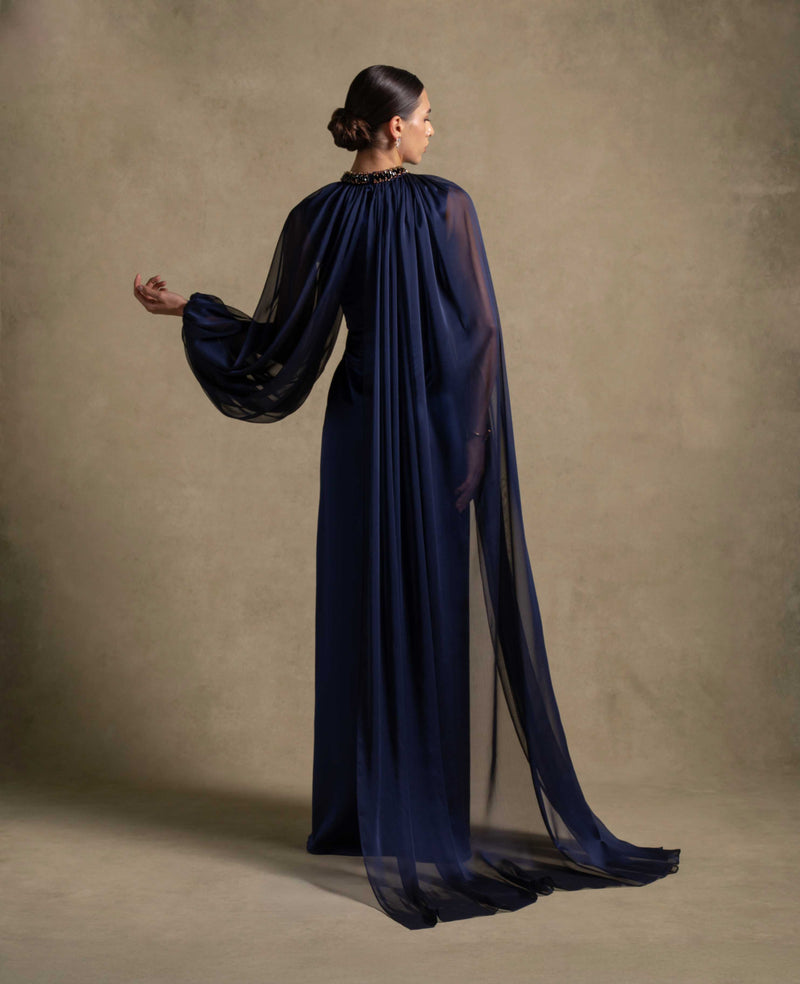Elegant Daryan Dress featuring flowing chiffon cape overlay, ideal for evening wear and luxurious events.